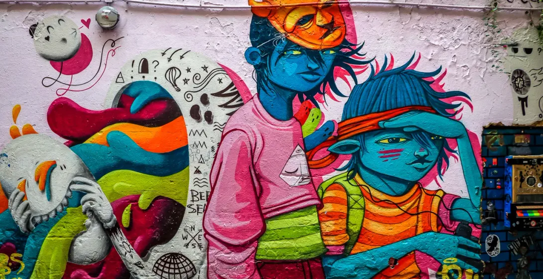 Kolorowy mural street art w Berlinie, Niemcy.
