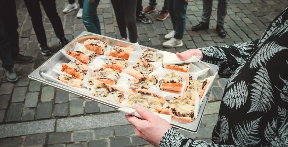 A guided food tour in Krakow, Poland, featuring traditional zapiekanki.