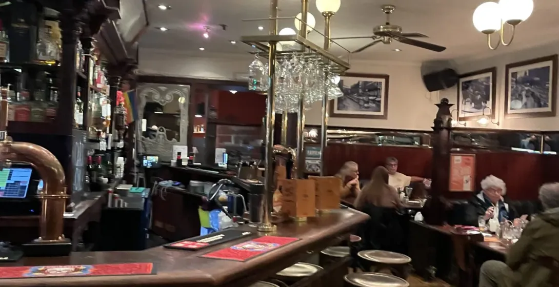 Cozy pub interior in London, perfect for a relaxing drink.