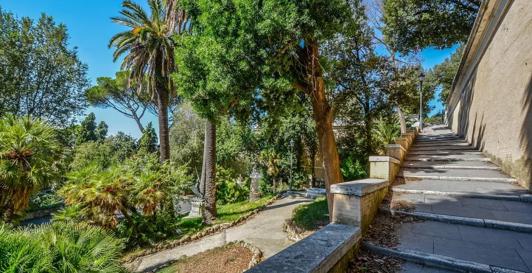 Serene staircase in a Roman garden.