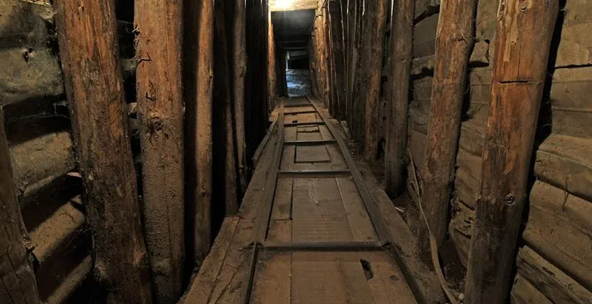 Interior of a dark, historical tunnel in Sarajevo.
