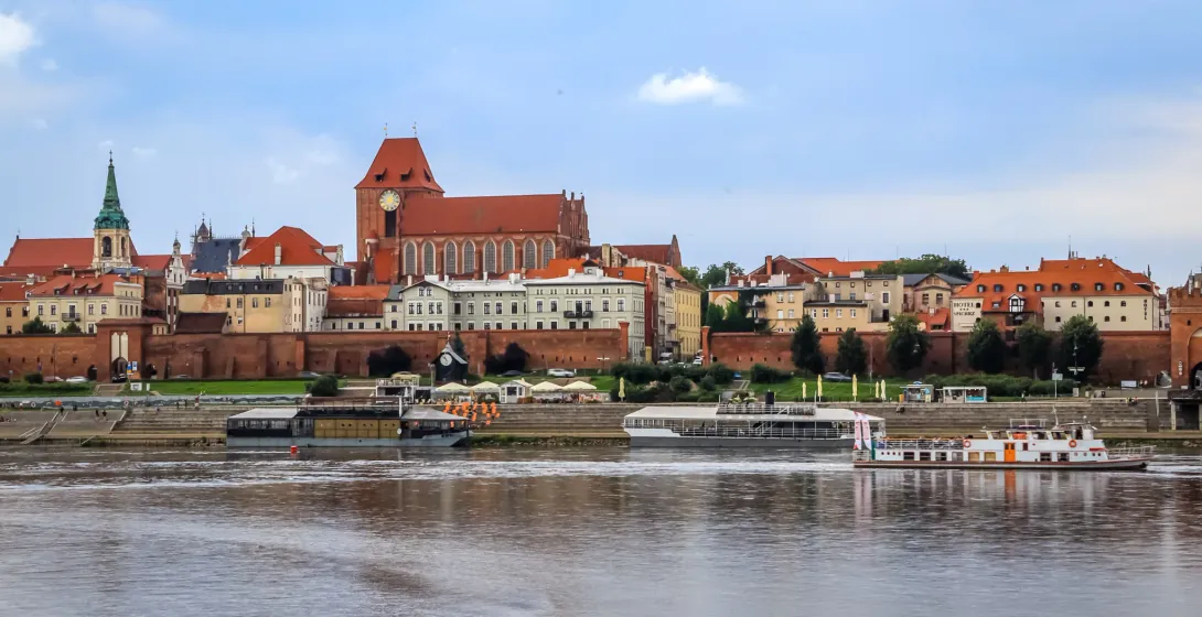 Scenic view of Toruń's Old Town from the Vistula River.