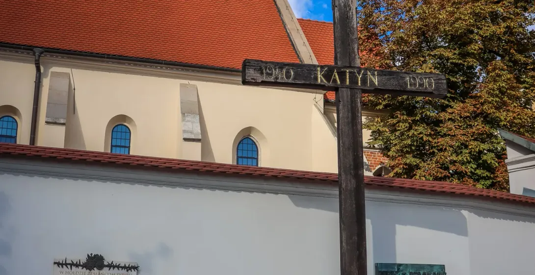 A somber memorial cross in Warsaw, Poland, commemorating the Katyn Forest massacre.