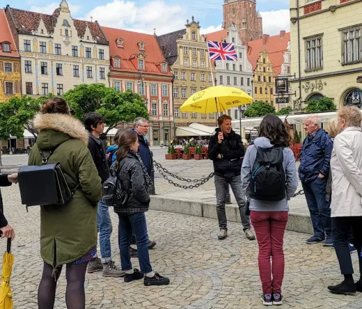 Guided walking tour in Wrocław's Market Square.