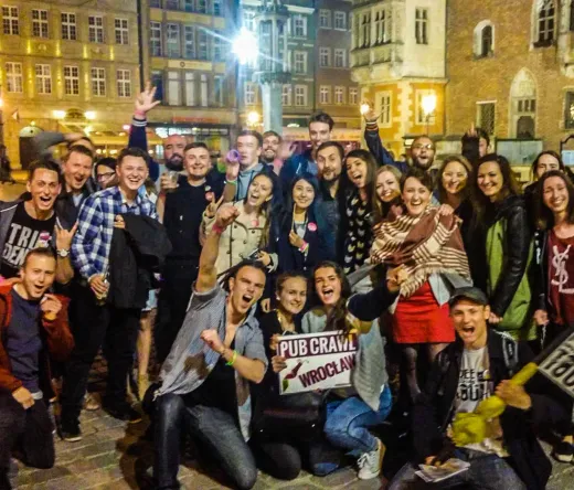 Happy tourists on a Wrocław pub crawl.