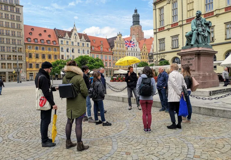 Guided walking tour in Wrocław's Market Square.
