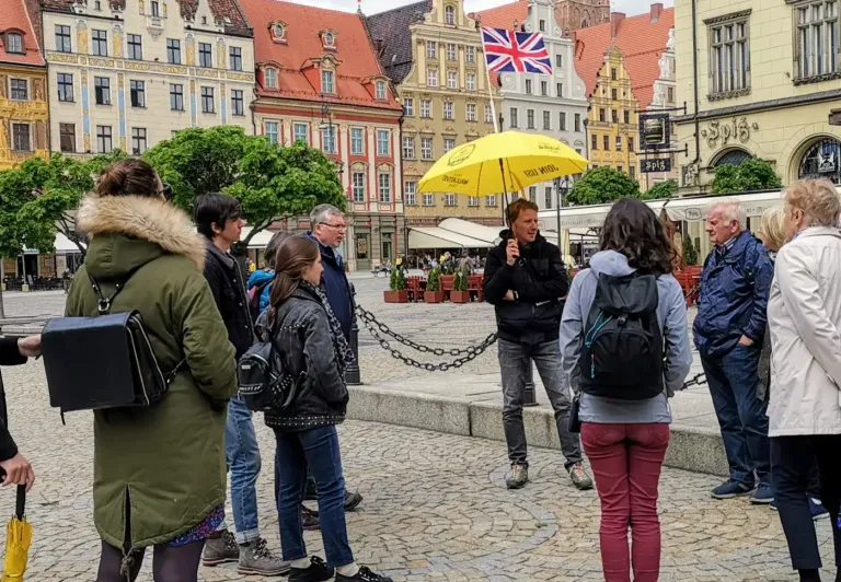 Guided walking tour in Wrocław's Market Square.