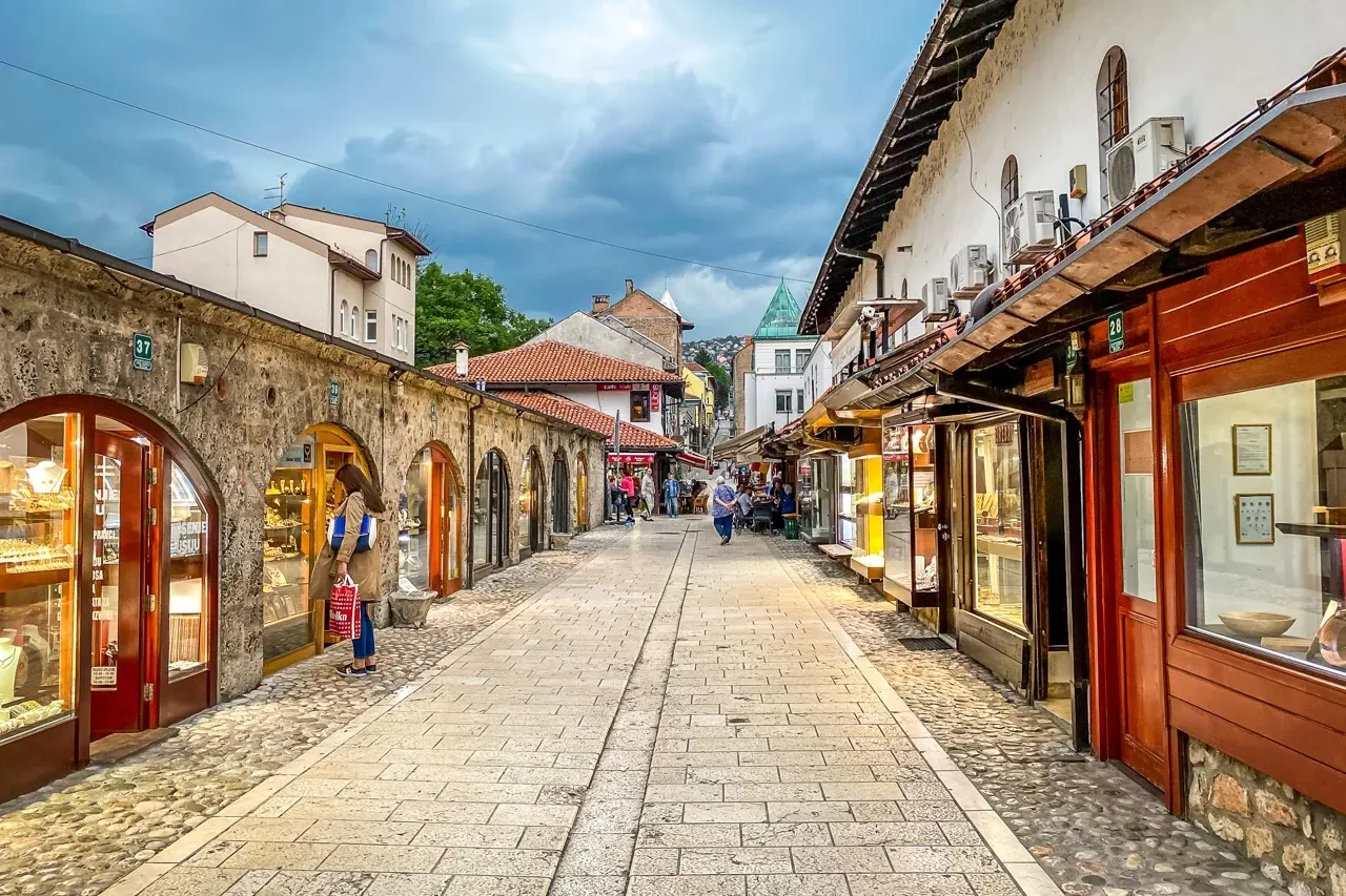 Picturesque street in Sarajevo's Old Town with traditional shops.
