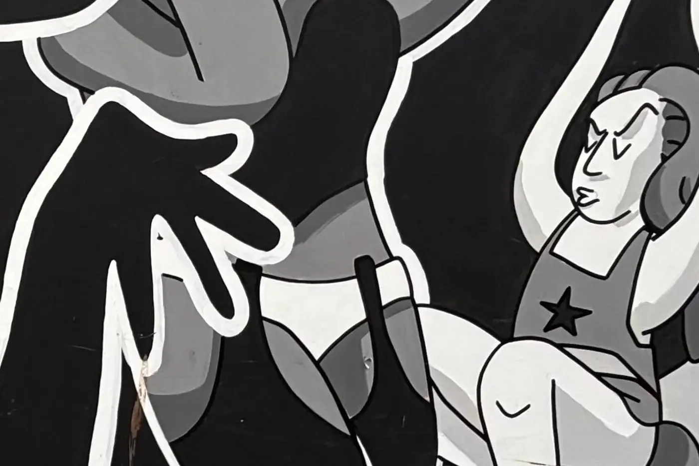 Black and white street art mural depicting figures in dynamic poses inspired by voguing. Text 'HOMENAJE AL VOGUING * NINON...