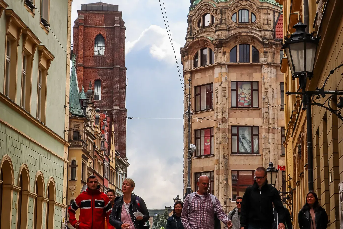 Tourists on a walking tour in Wrocław, Poland.
