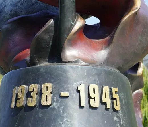 Close-up of a bronze sculpture in Prague, commemorating 1938-1945.