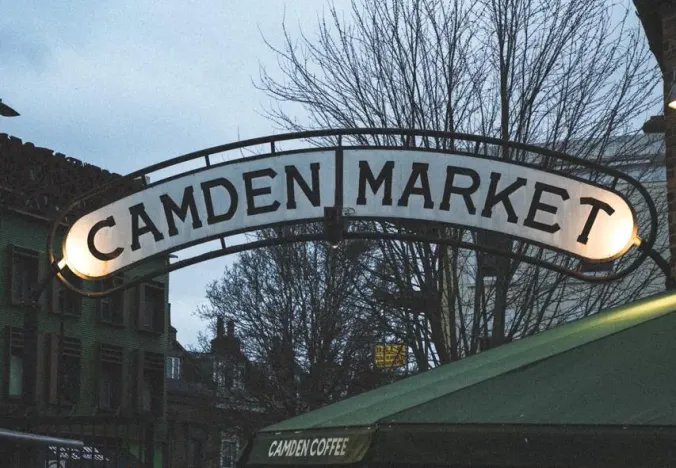 Tourists gather near the iconic Camden Market arch in London.