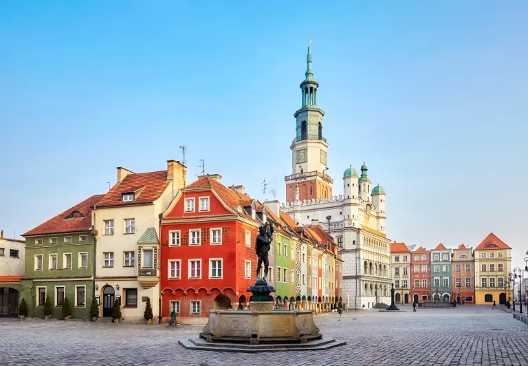 Picturesque Zamość Old Town Market Square in Poland, featuring the Renaissance Town Hall and colorful buildings.