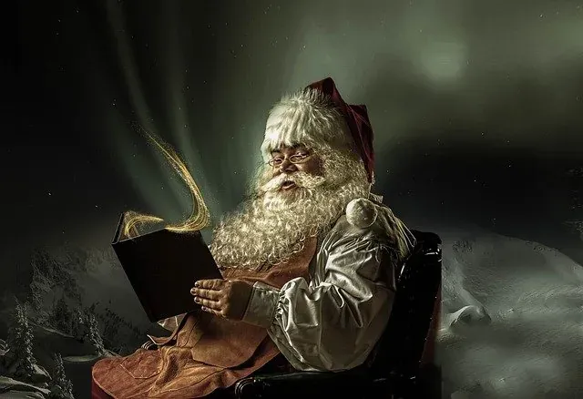 Santa Claus in red suit and glasses, reading an open book glowing with magic, against a snowy mountain backdrop.
