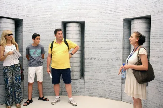 Tour group in Warsaw museum exhibit.
