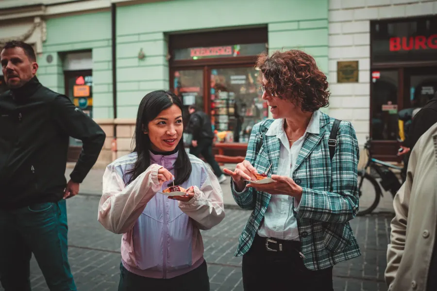 A food tour group in Krakow, Poland, enjoying local pastries.