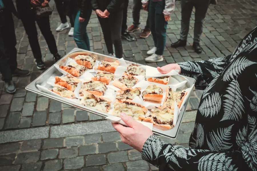 A guided food tour in Krakow, Poland, featuring traditional zapiekanki.