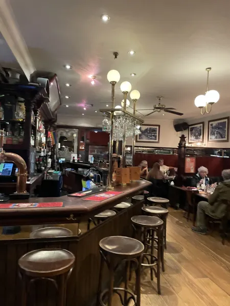 Cozy pub interior in London, perfect for a relaxing drink.