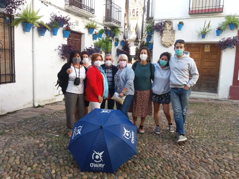 A group of happy tourists on an Oway Tours excursion in Spain.