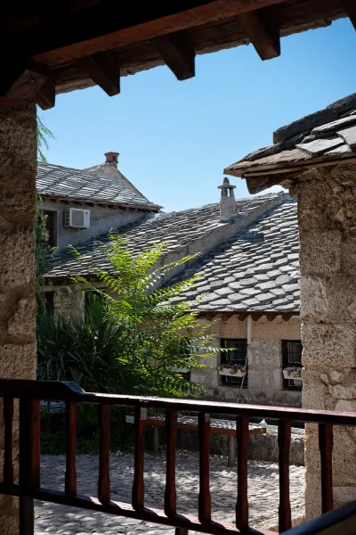 Charming view of historic stone rooftops in a village.