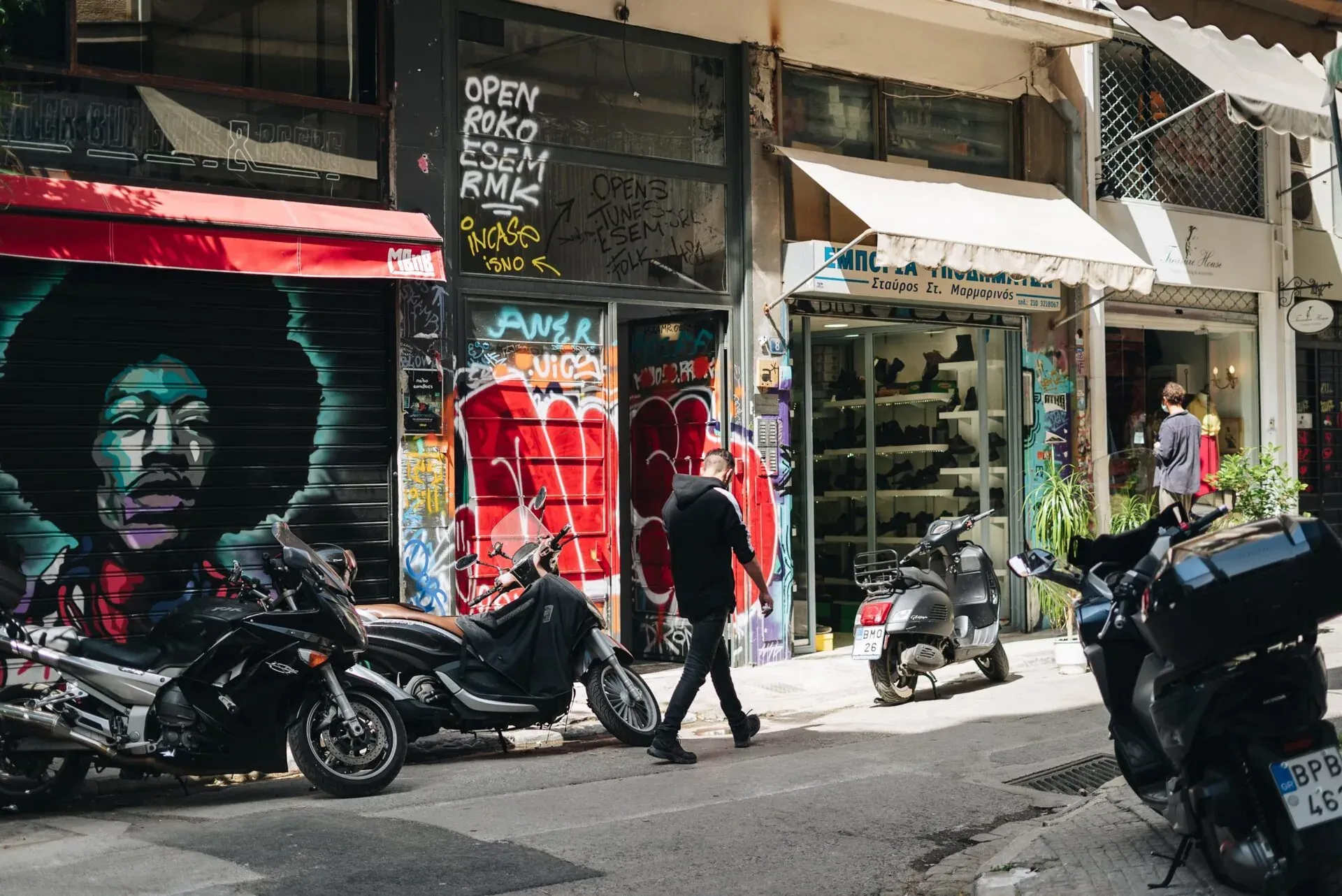 Tourists exploring Athens, Greece, near the Acropolis.