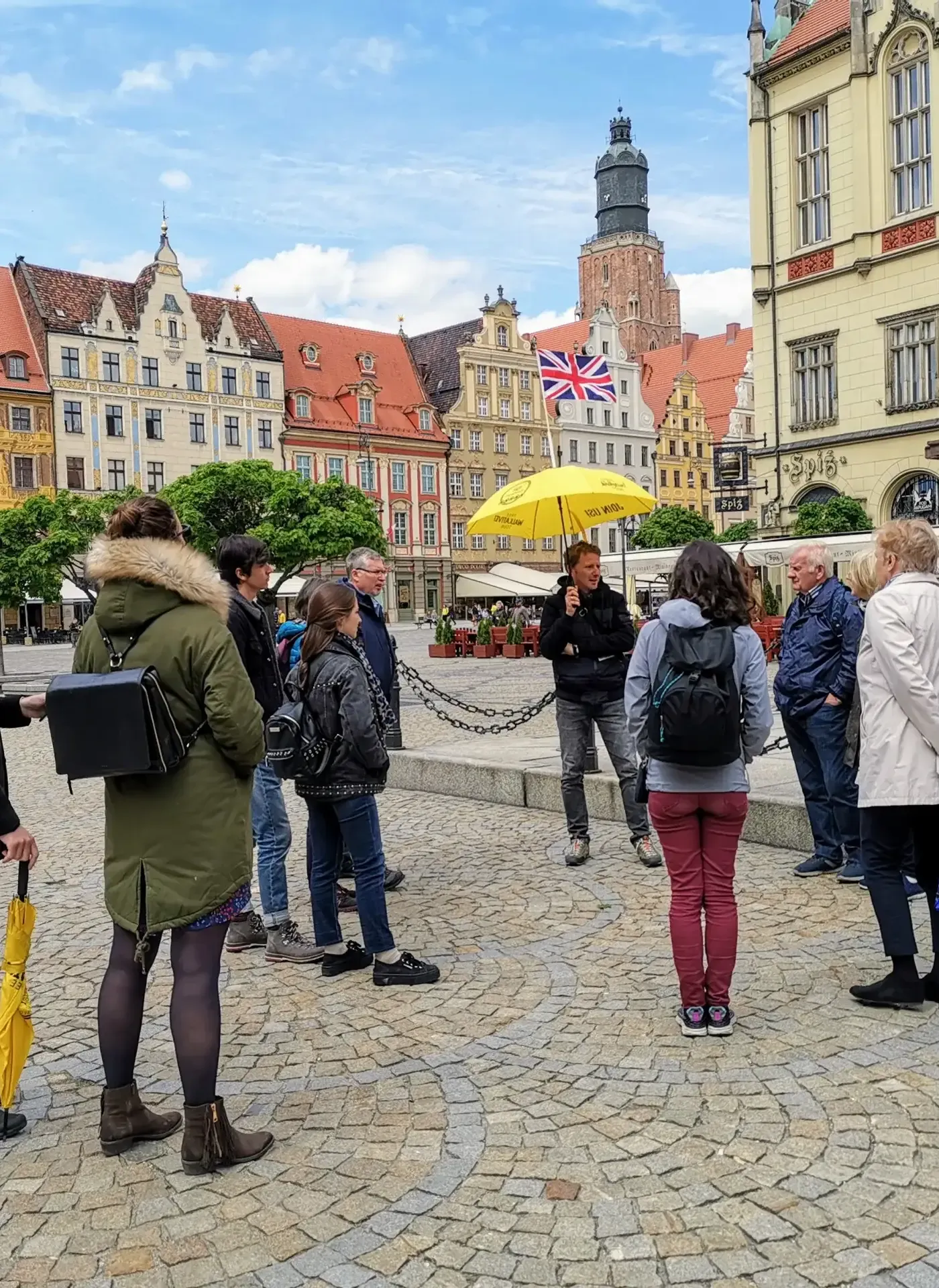 Guided walking tour in Wrocław's Market Square.