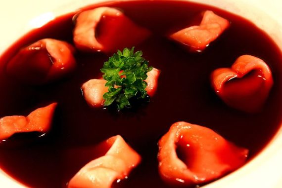 Beetroot soup with small dumplings.